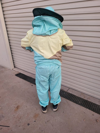 Australian man wearing protective beekeeping clothing including pastel blue hat with veil, beekeeping jacket and elastic pants. Available in size 3-3XL