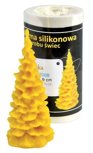 A silicone mould in the shape of a Christmas tree, with beeswax Christmas tree candle beside it.