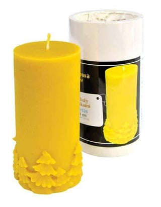 Image of 13cm pillar candle made from beeswax with christmas tree detail around the base, made using silicone candle mould. 