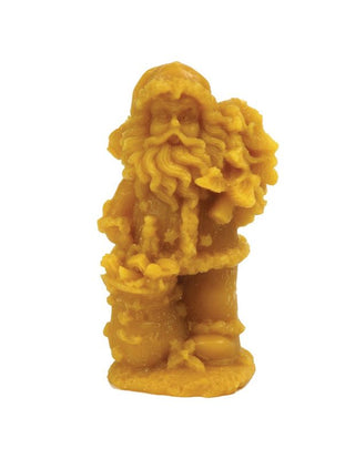 A silicone mould in the shape of Santa Claus with a Christmas tree.