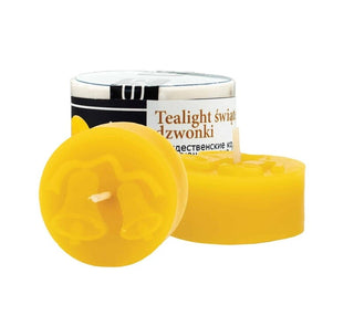 Beeswax tealight candle silicone mould with Christmas bells on white background. 